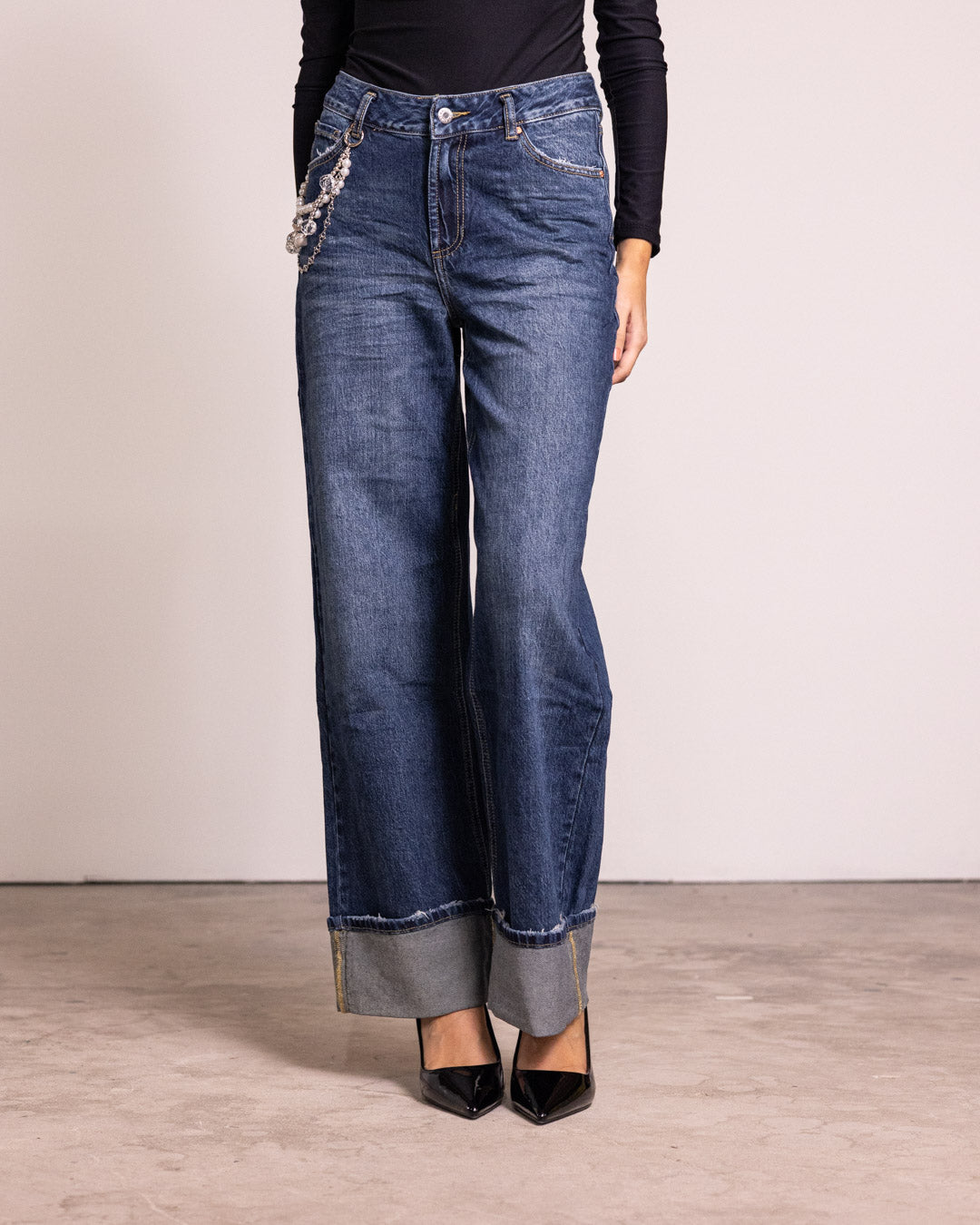 Jeans palazzo con risvolto medio