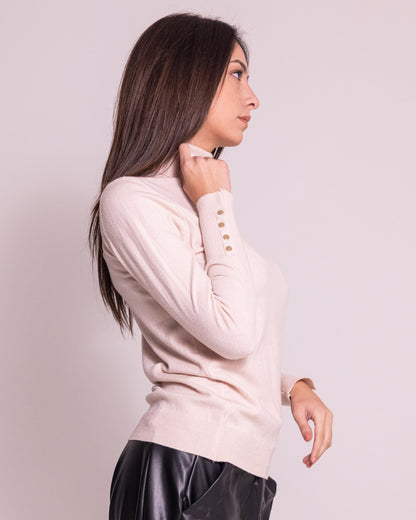 Dolcevita collo alto con bottoni sui polsi