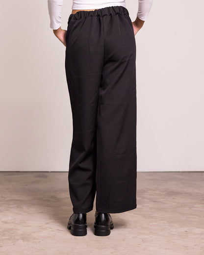 Pantalone palazzo con pinces