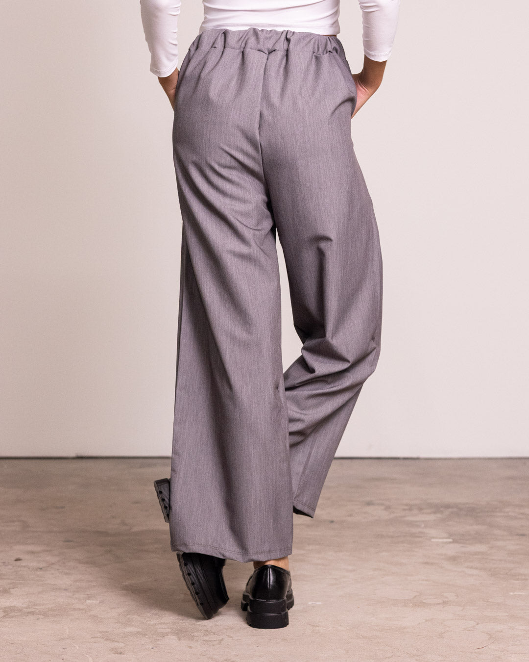 Pantalone palazzo con pinces