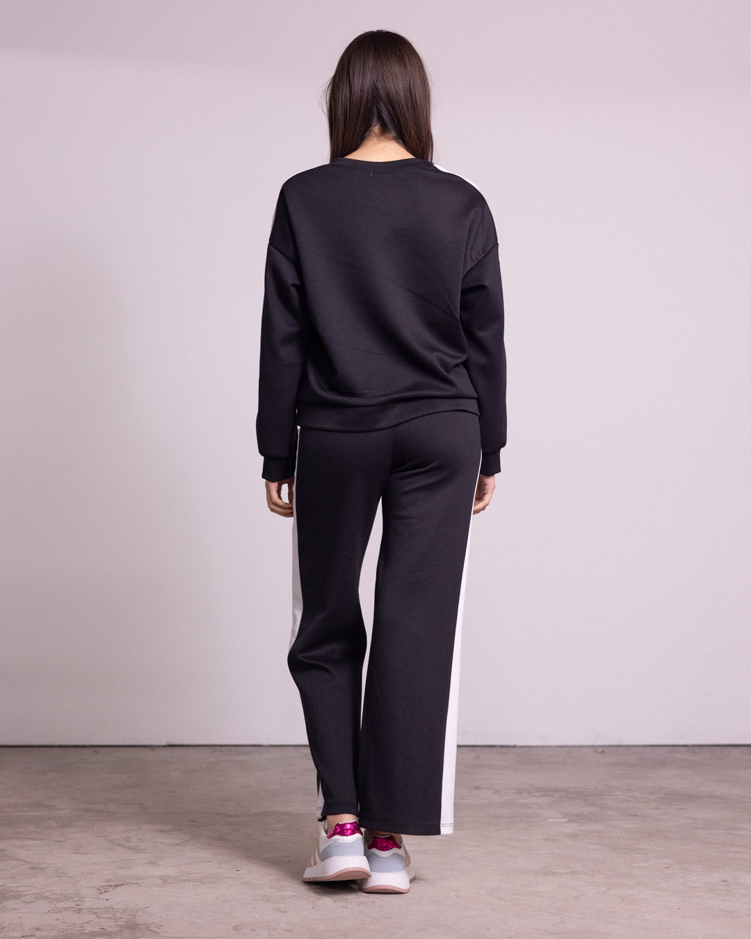 Tuta completa con banda laterale