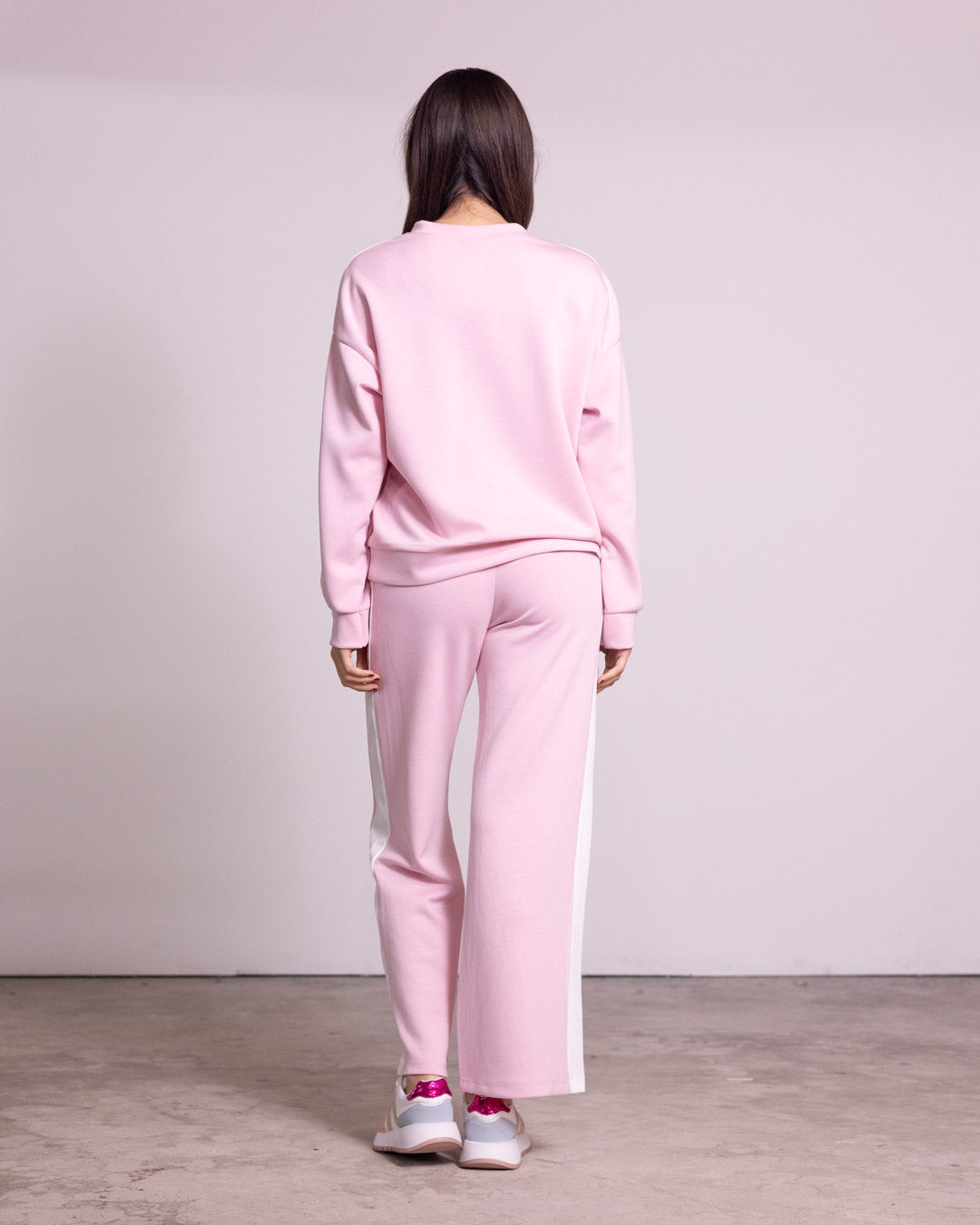 Tuta completa con banda laterale