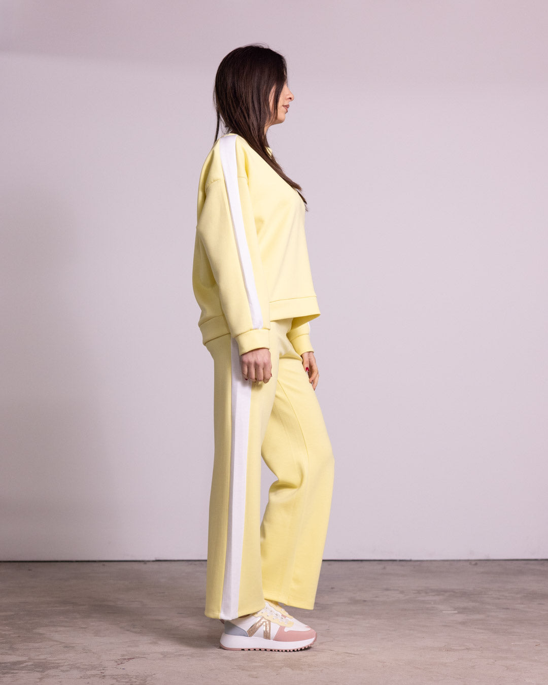 Tuta completa con banda laterale