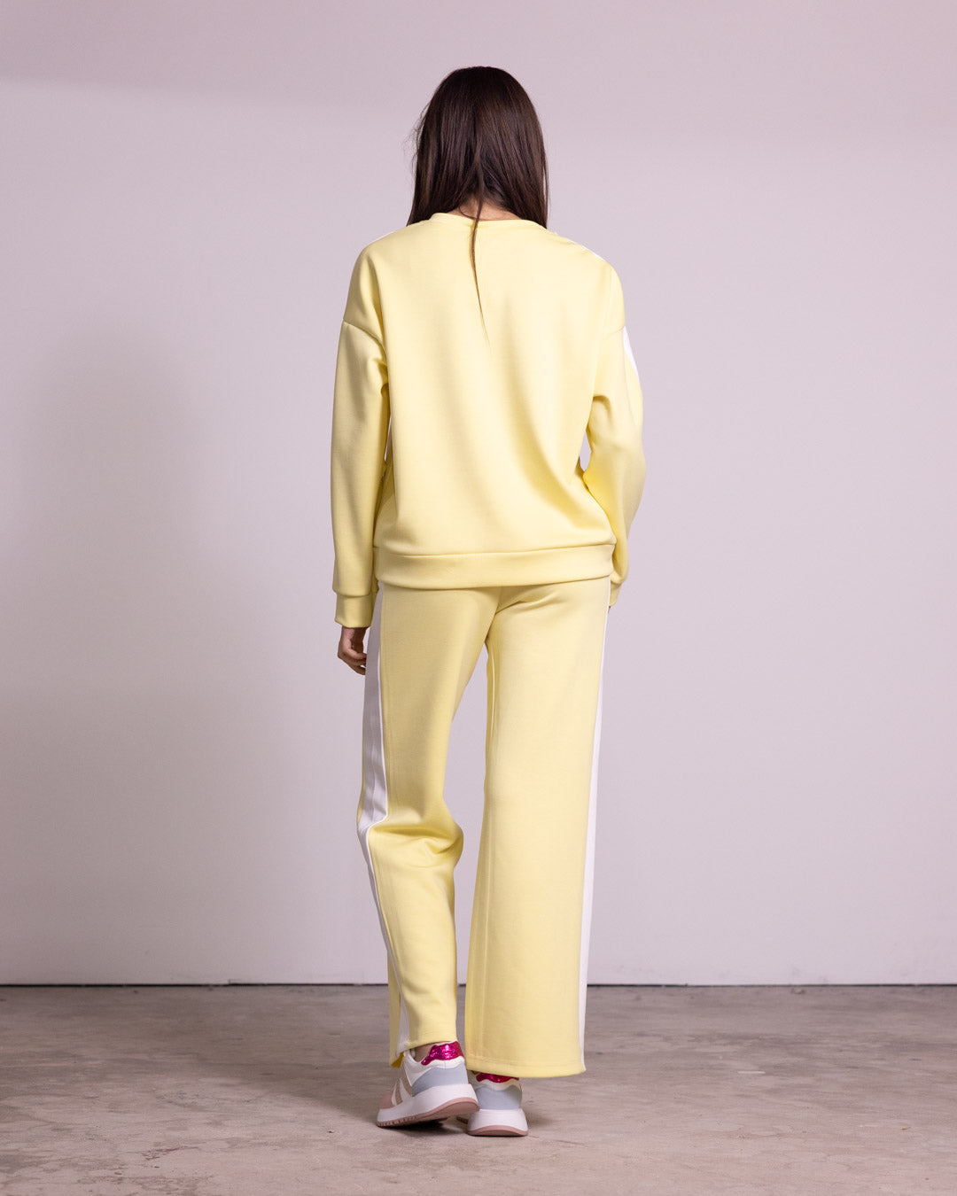 Tuta completa con banda laterale