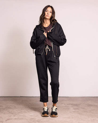 Tuta completa con zip e cappuccio