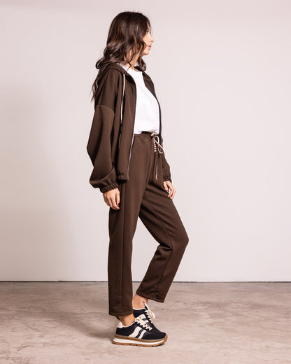 Tuta completa con zip e cappuccio