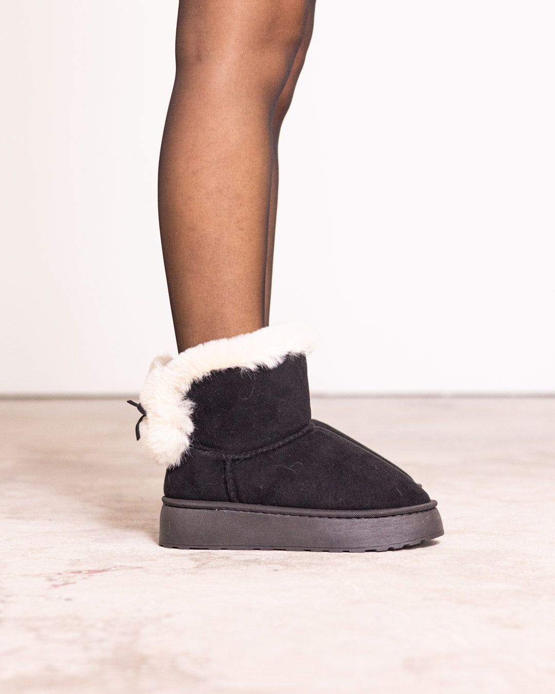 Mini boot con pelliccia