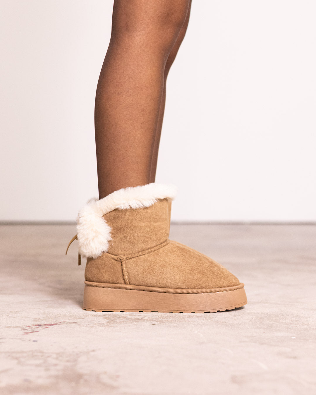 Mini boot con pelliccia