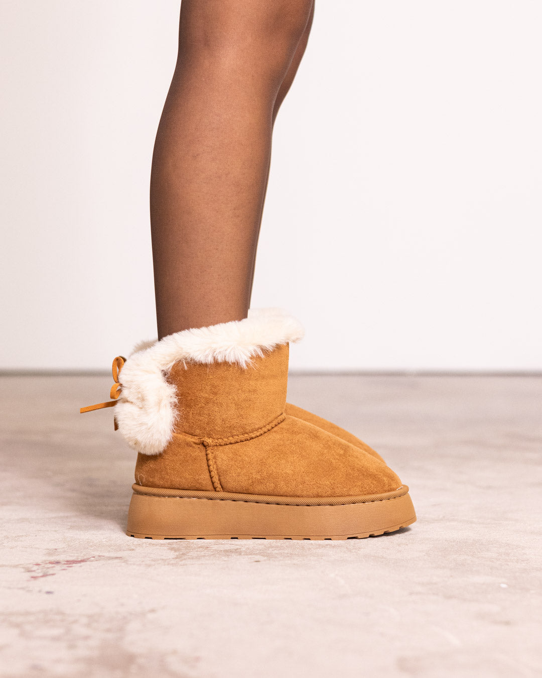 Mini boot con pelliccia