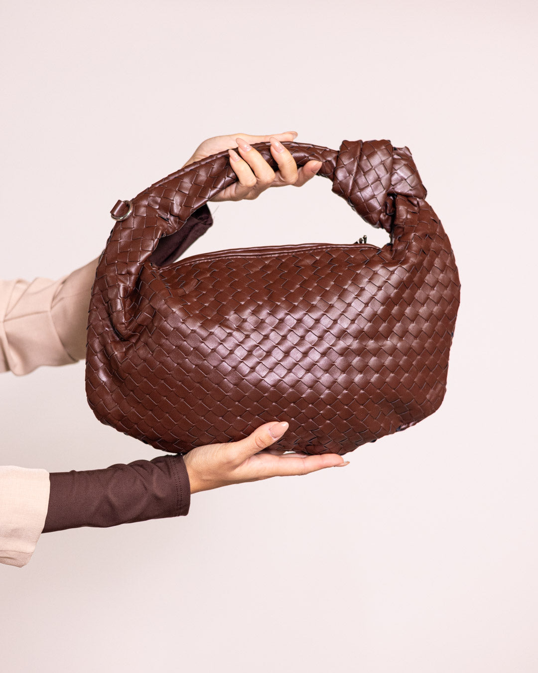 Borsa a mano intrecciata