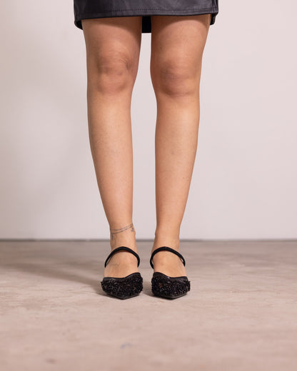 Décolleté a punta con decorazioni